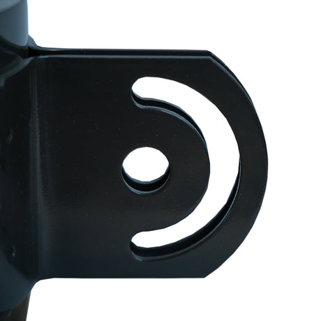 Close-up of a black metal bracket with a white circular cutout on a white background