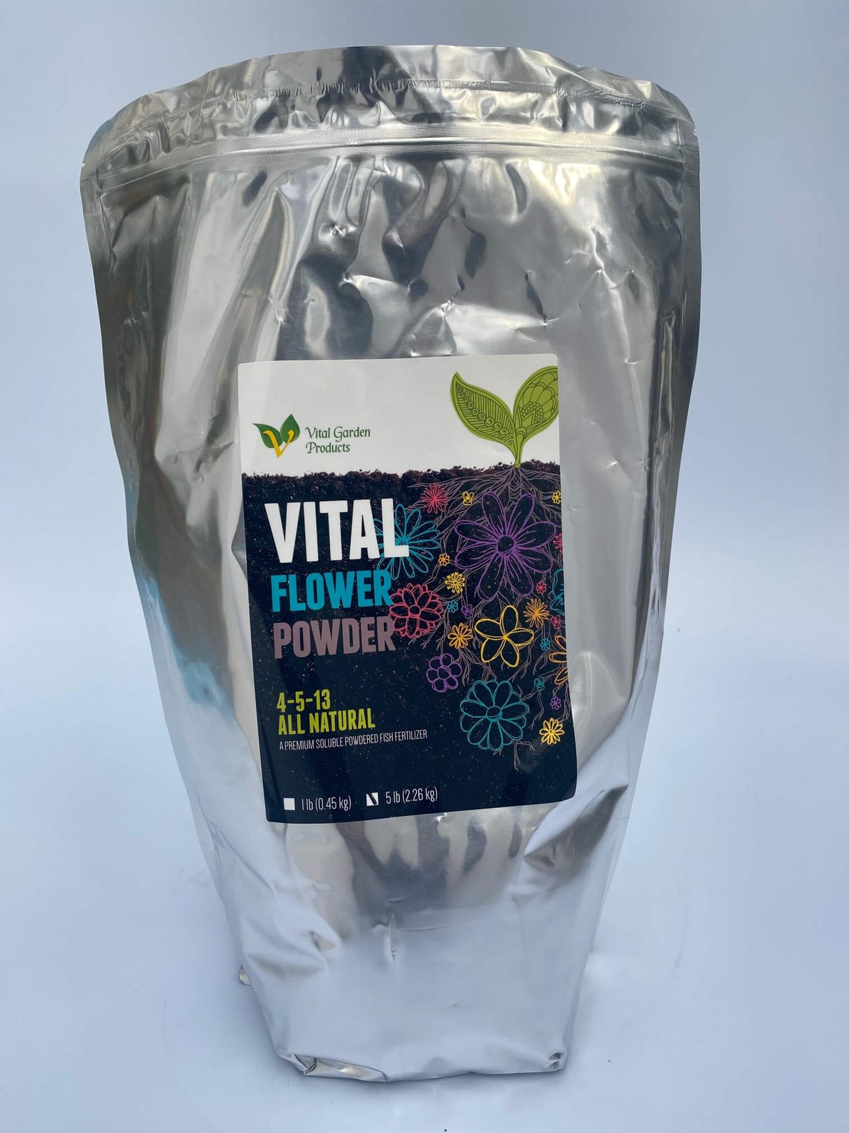 Silver packaging of Vital Flower Powder with a label on a light gray background