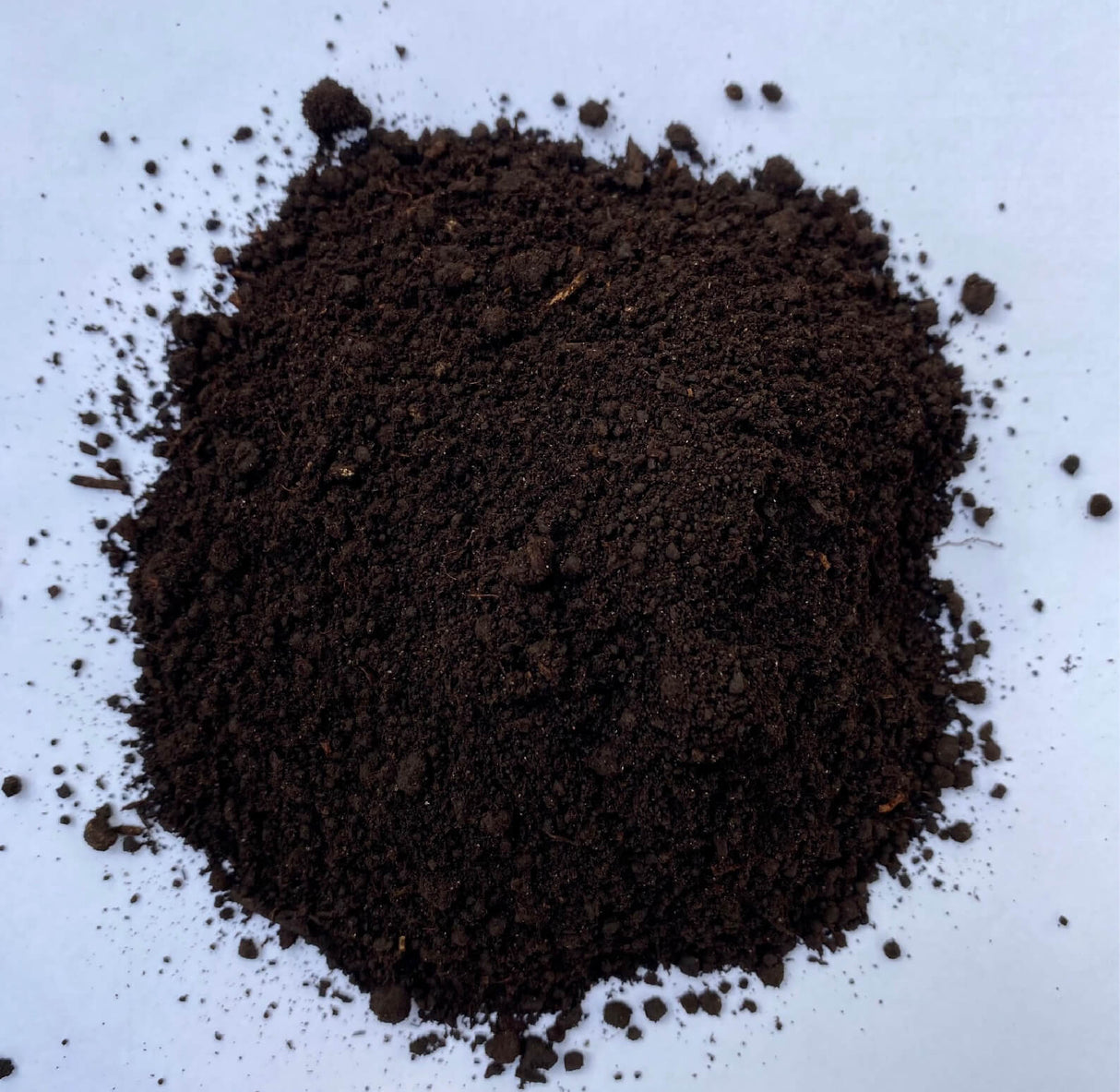 Coarse ground coffee on a white background