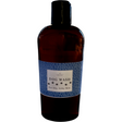 Bottle of dog wash with a label on a white background