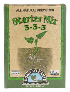 Box of Down to Earth all natural fertilizer starter mix on a white background
