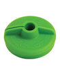 Green plastic cap with a central hole on a white background