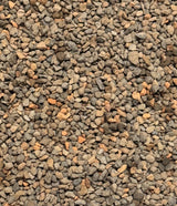 Close-up of small gravel stones with a brown and gray color.