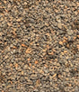 Close-up of small gravel stones with a brown and gray color.