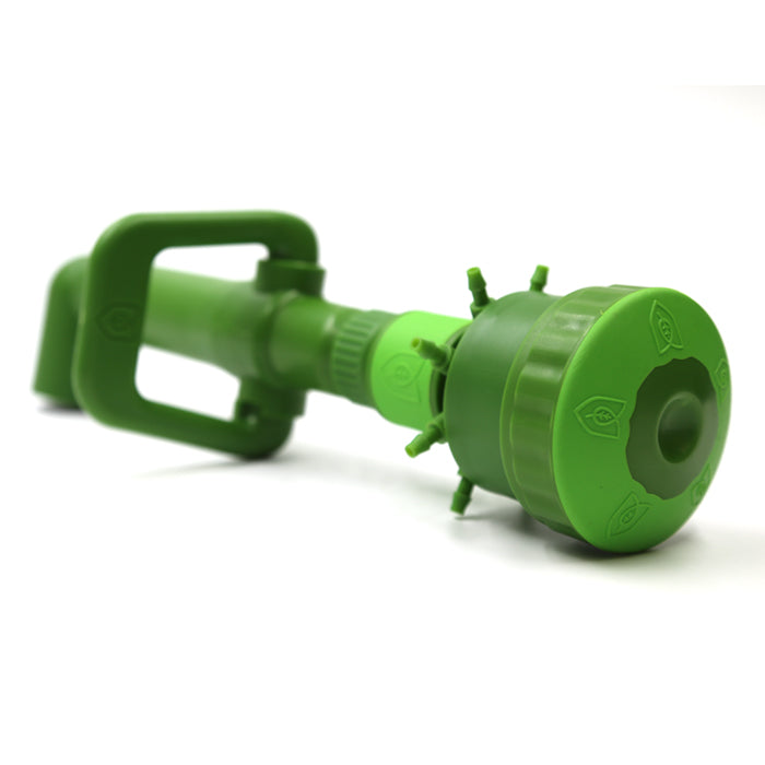 Green plastic sprinkler on a white background