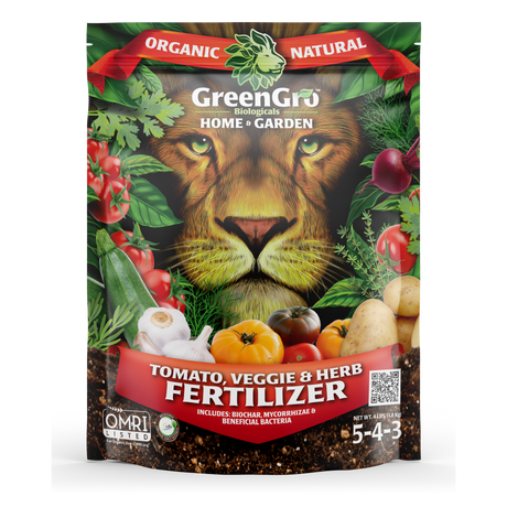 GreenGro Biologicals Organic Natural Home & Garden Tomato, Veggie & Herb Fertilizer in a stand-up resealable pouch. The packaging features a large lion face surrounded by illustrated tomatoes, garlic, herbs, and soil, with the product name in red banners.