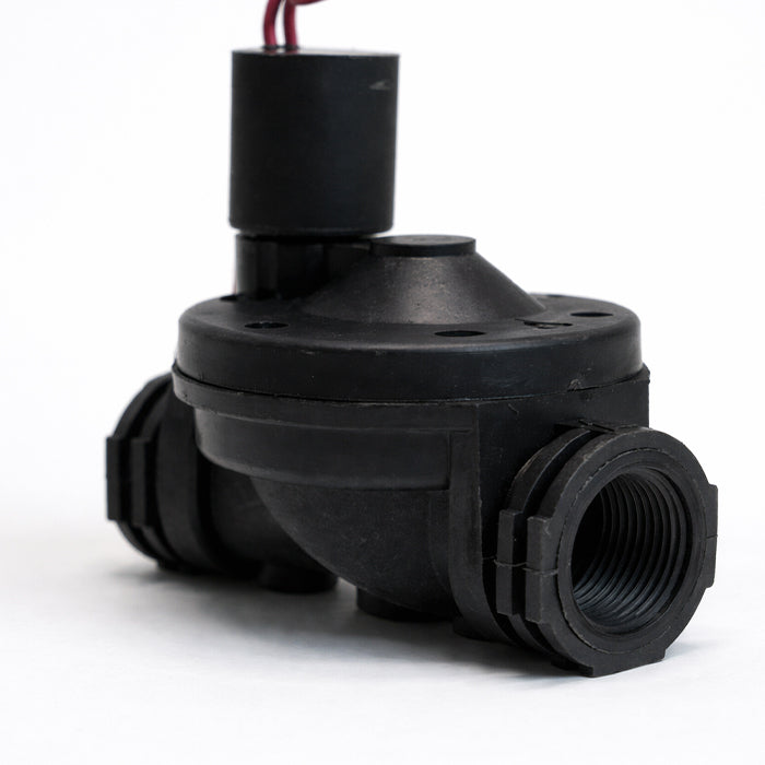 Black mechanical component on a white background