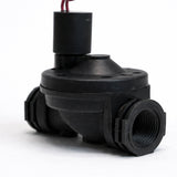 Black mechanical component on a white background
