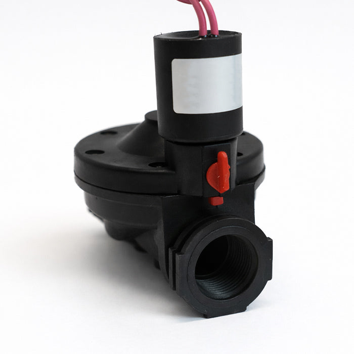 Black mechanical valve with red lever on a white background