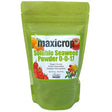 Green bag of maxicrop soluble seaweed powder on a white background