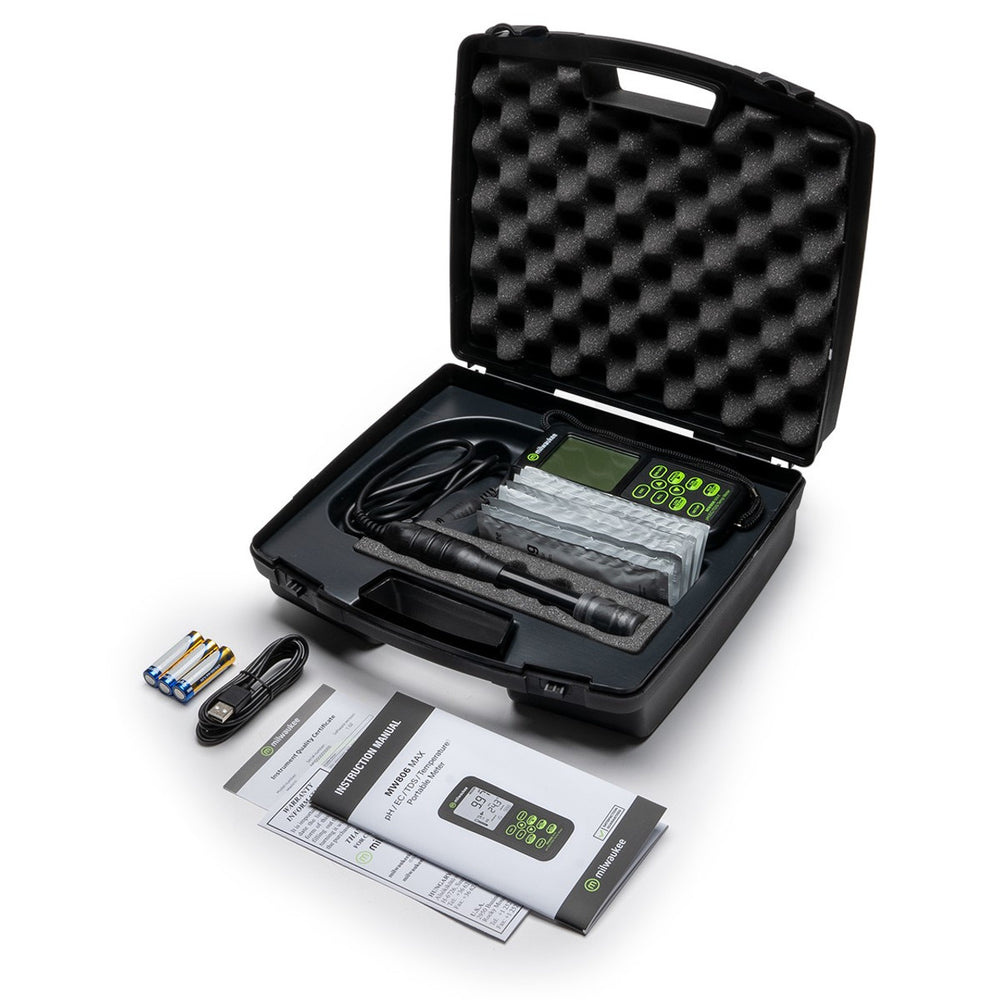 Black electronic device with accessories on a white background