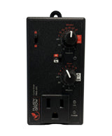 Black electronic timer with multiple knobs and a power outlet on a white background