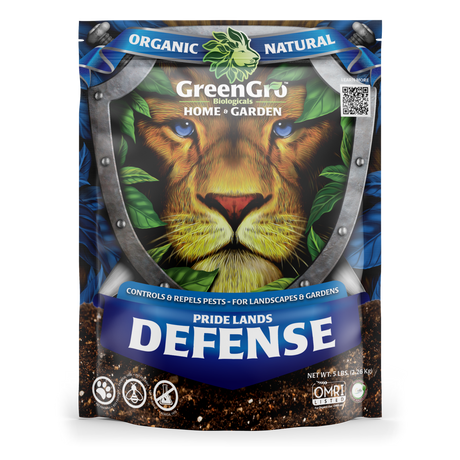 A stand-up pouch of GreenGro Biologics Pride Lands Defense organic natural home and garden product, featuring a large illustrated lion face on a shield-shaped background with blue and brown packaging design.