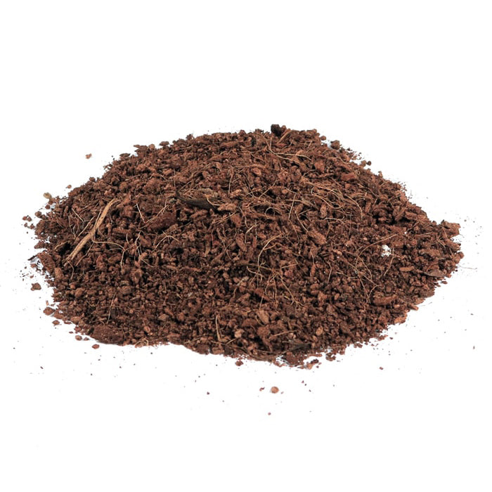 Pile of brown compost on a white background