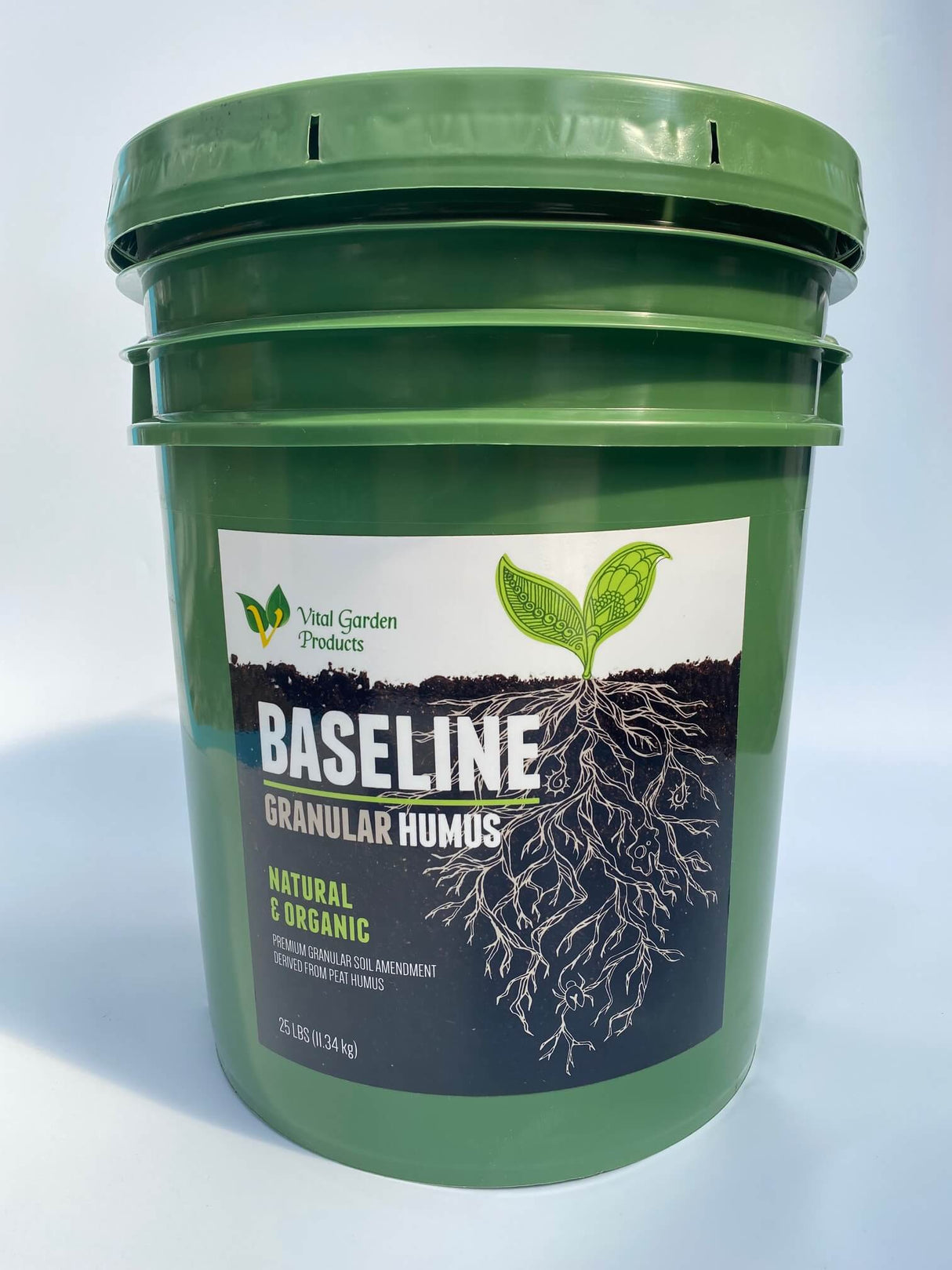 Green bucket of Baseline Granular Humus with a white label on a light gray background