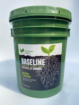Green bucket of Baseline Granular Humus with a white label on a light gray background