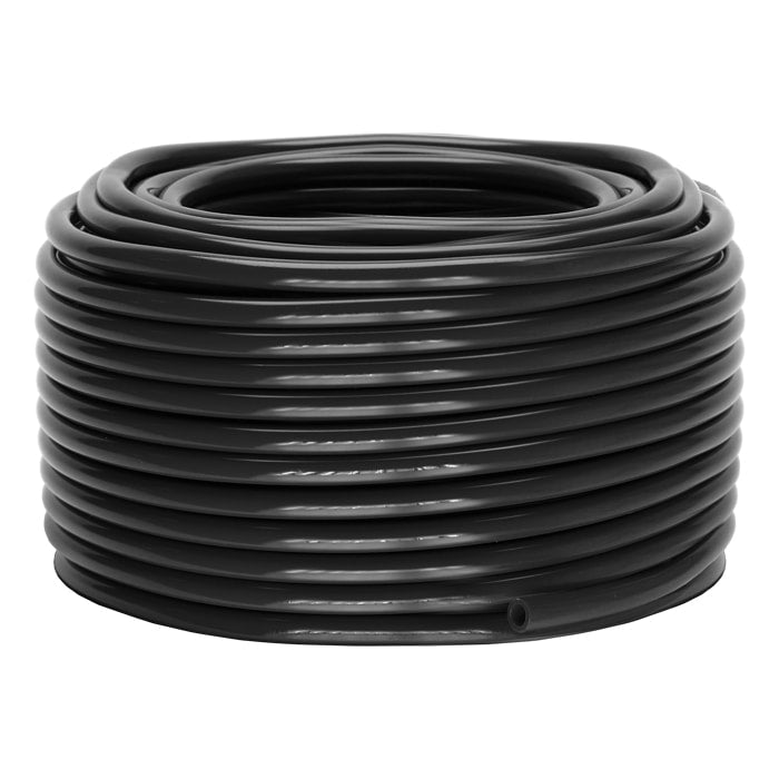 Coiled black rubber hose on a white background