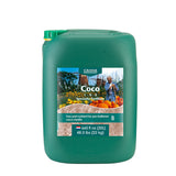 Green container of Canna Coco fertilizer on a white background