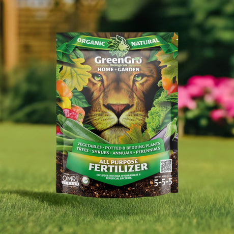 GreenGro all-purpose fertilizer packet with a lion's face on a garden background