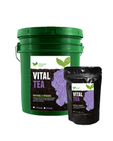 Green bucket and black pouch labeled 'Vital Tea' on a white background
